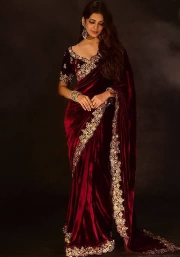 Maroon color embroidered velvet saree